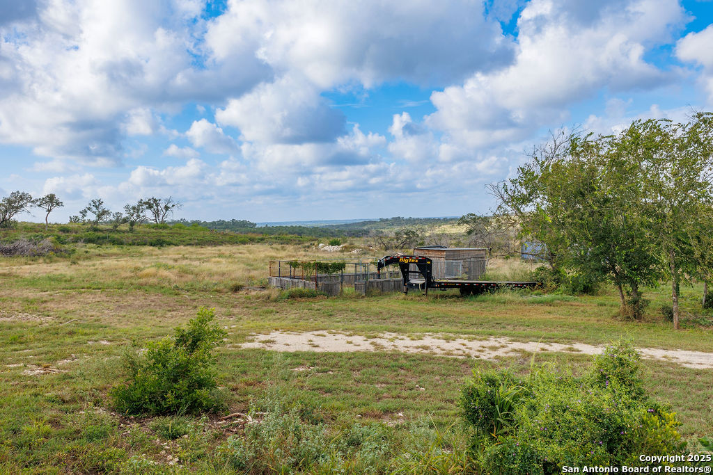 744 County Road 2651 Rio Medina, TX 78066 - Photo 7 of 29 a view of a lake with houses in the back