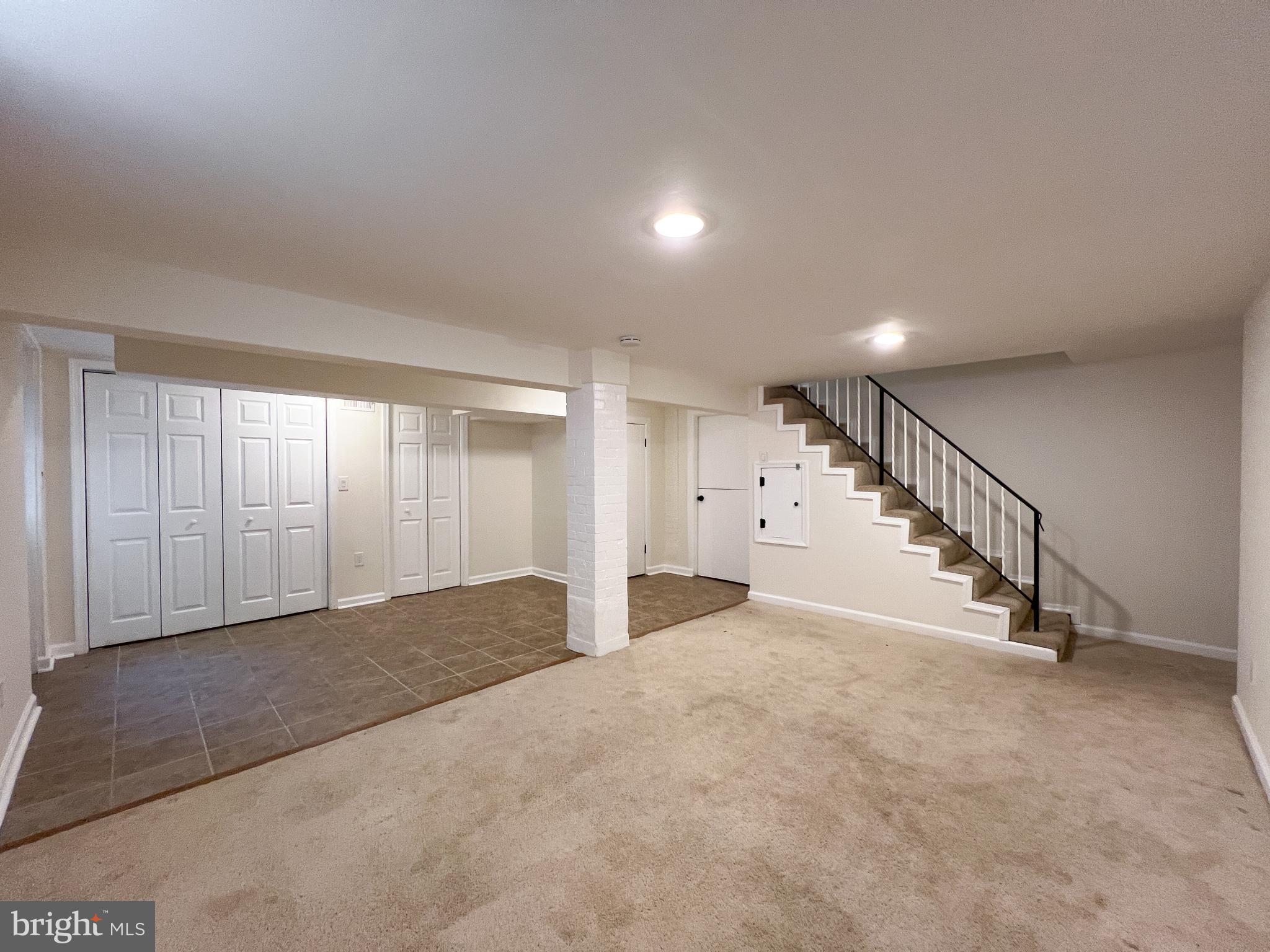 10159 Sutherland Road Silver Spring, MD 20901 - Photo 28 of 30 a view of an empty room with stairs