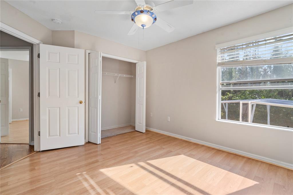 565 Pinehurst Cove Kissimmee, FL 34758 - Photo 11 of 36 a view of an empty room with a window