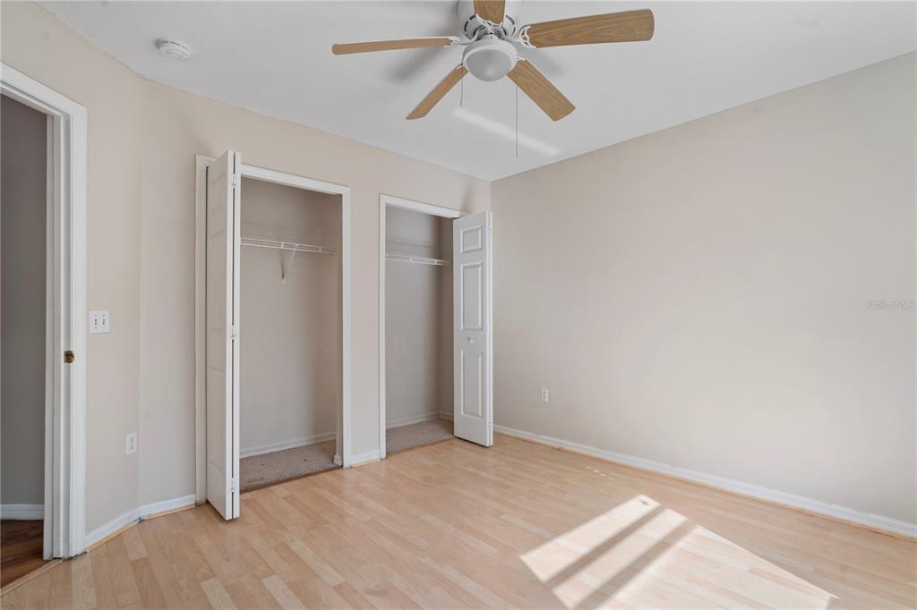 565 Pinehurst Cove Kissimmee, FL 34758 - Photo 12 of 36 a view of empty room with wooden floor