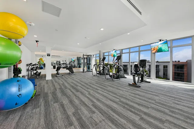 a view of a room with gym equipment