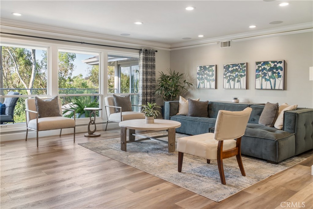 2373 Arroyo Drive Riverside, CA 92506 - Photo 6 of 29 a living room with furniture and a large window