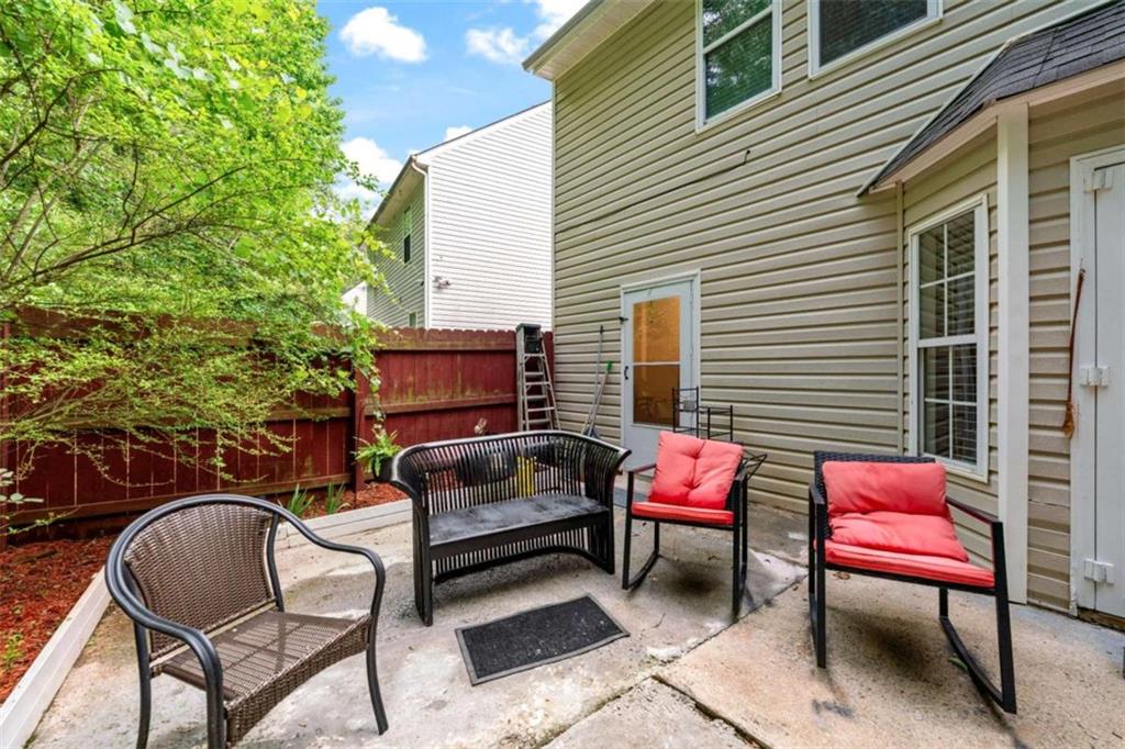 248 Springbottom Drive Southeast Lawrenceville, GA 30046 - Photo 27 of 32 a building outdoor space with patio furniture