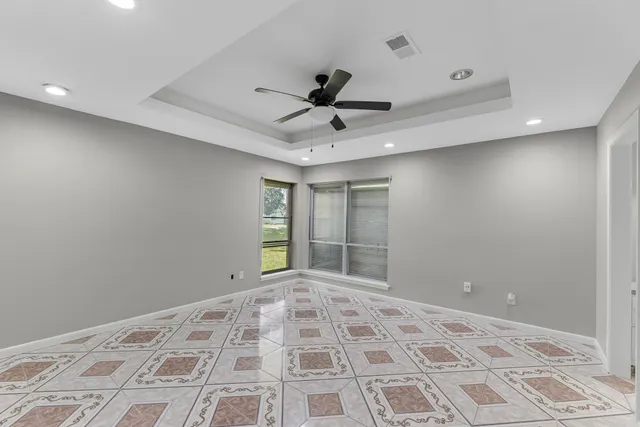 a view of a hallway with a chandelier