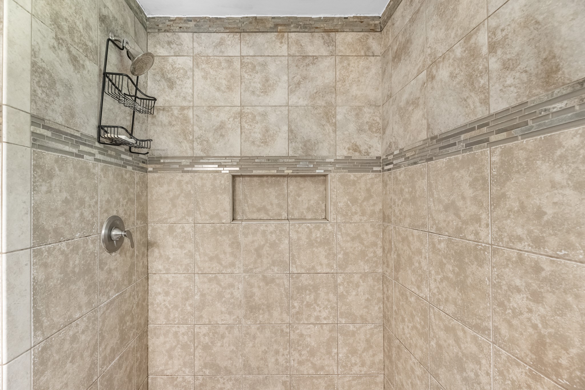 1109 Becker Street Channelview, TX 77530 - Photo 27 of 49 a bathroom with a shower