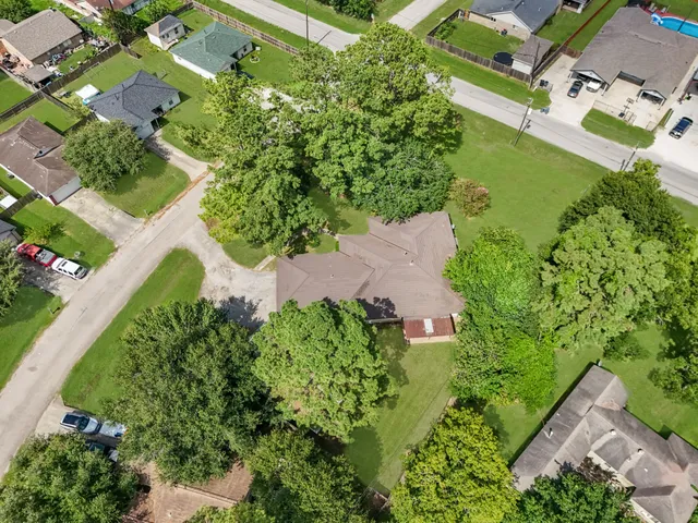 a view of a dining room that has a table and chairs