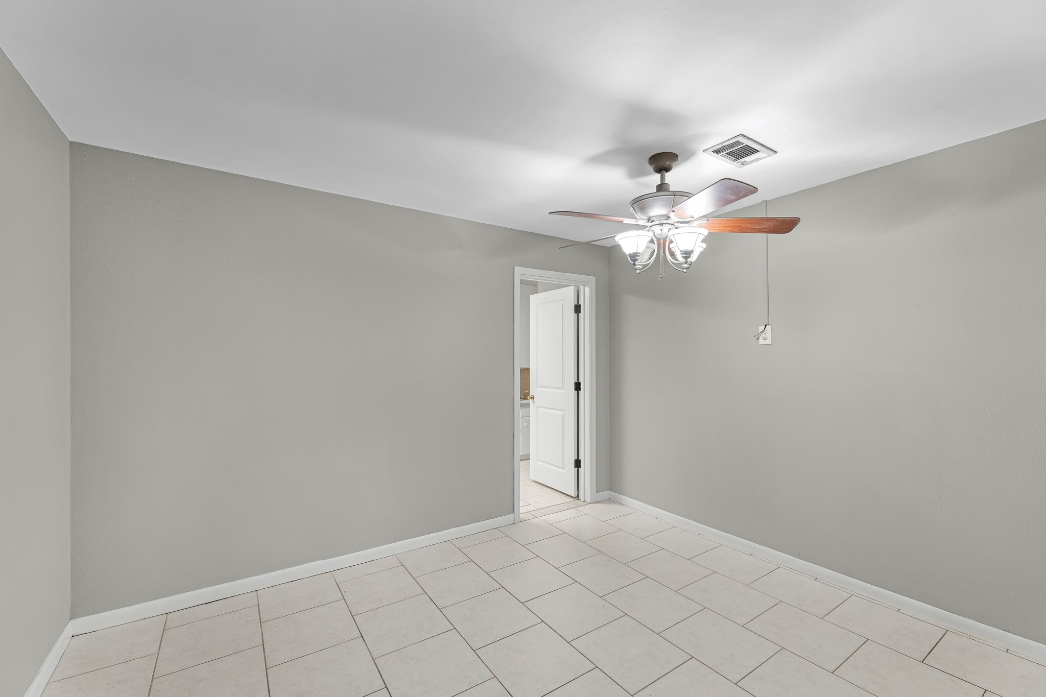1109 Becker Street Channelview, TX 77530 - Photo 35 of 49 a view of a chandelier fan in a room