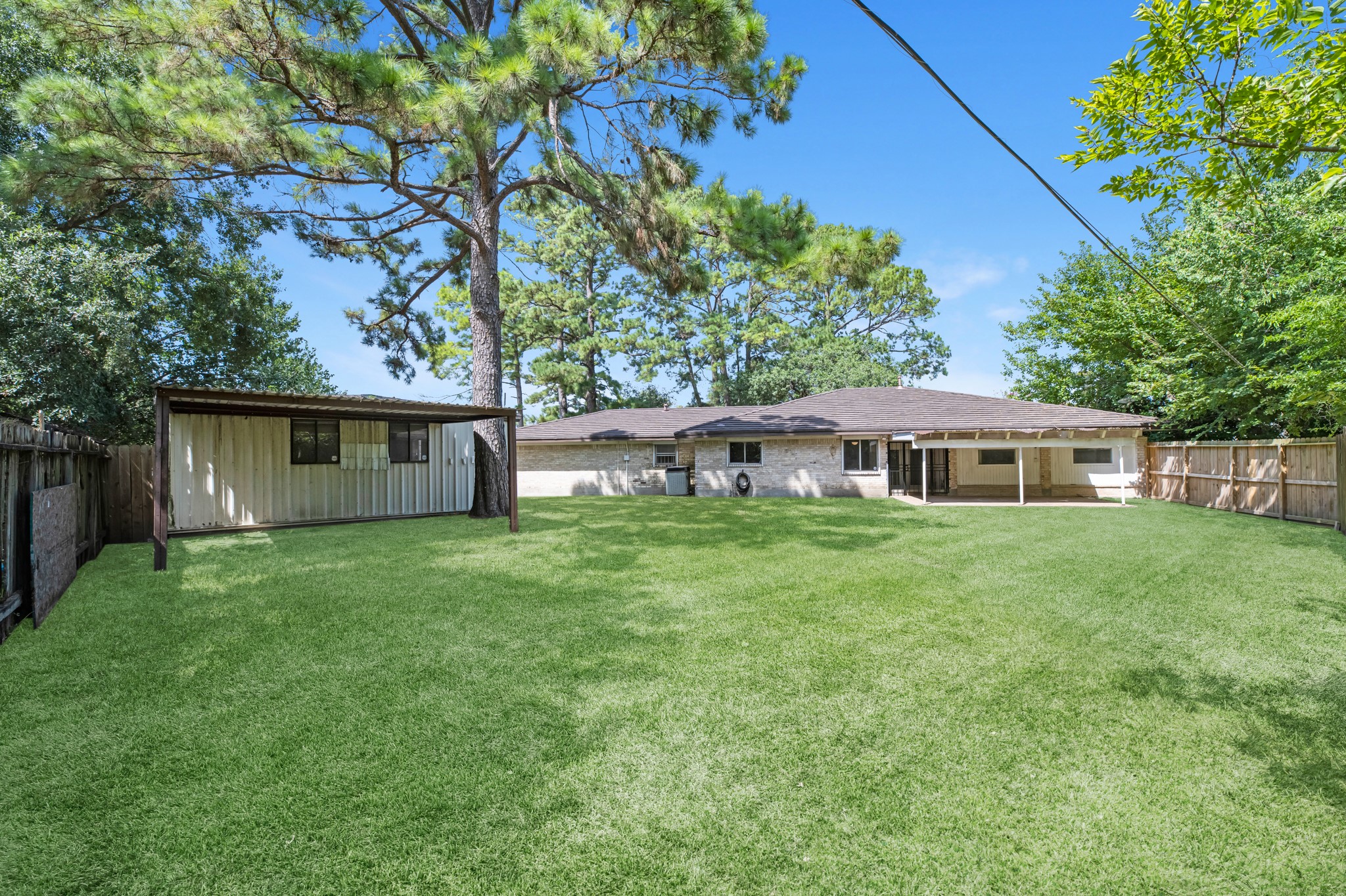 1109 Becker Street Channelview, TX 77530 - Photo 38 of 49 a front view of a house with a garden