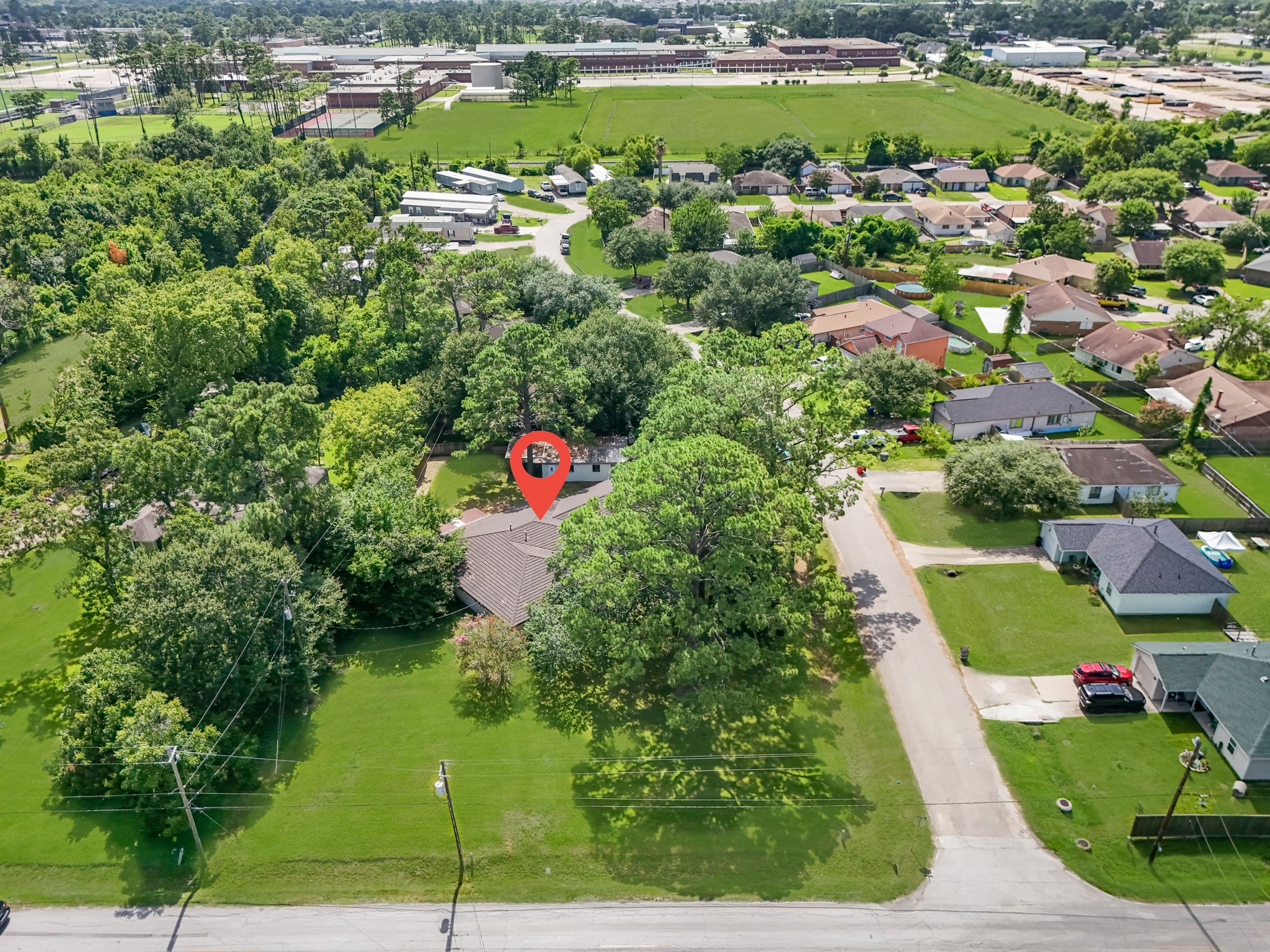 1109 Becker Street Channelview, TX 77530 - Photo 46 of 49 a view of a garden with a swimming pool
