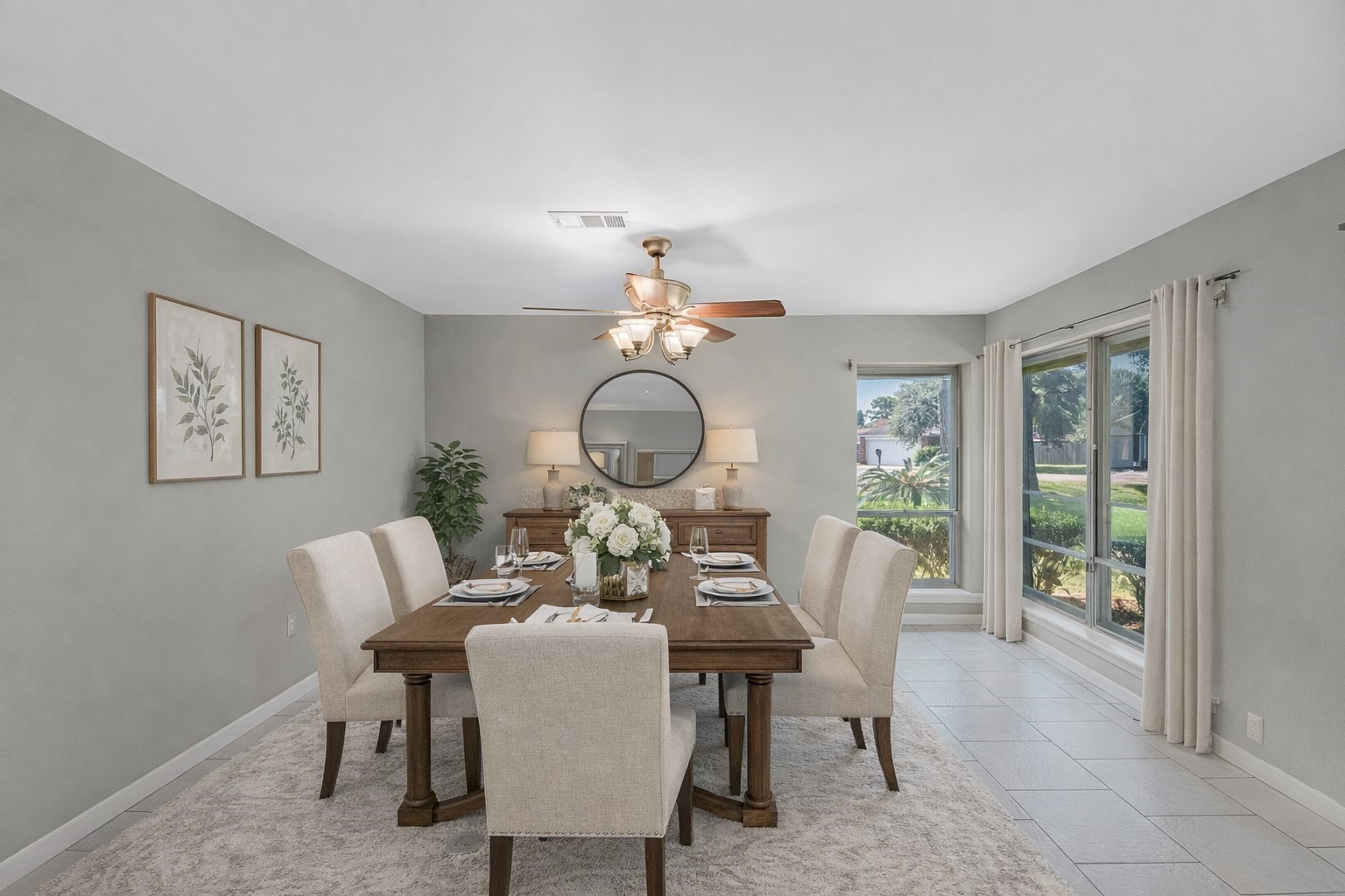 1109 Becker Street Channelview, TX 77530 - Photo 5 of 49 a dining room with wooden floor a glass table and chairs