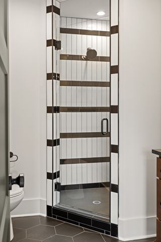 a room with lots of cabinet and a window