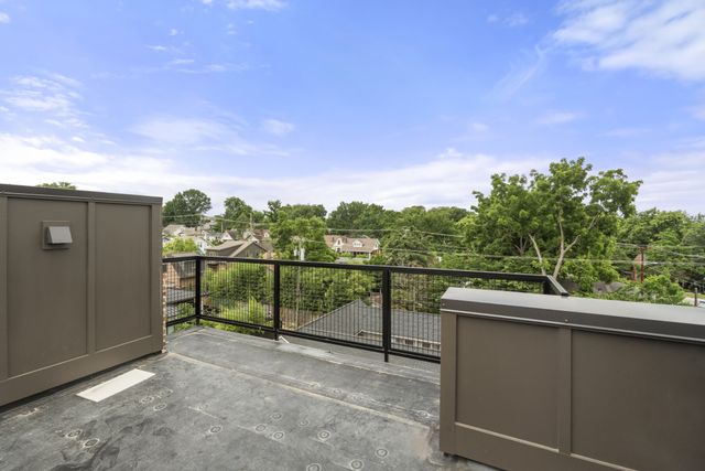 a view of a balcony with city view