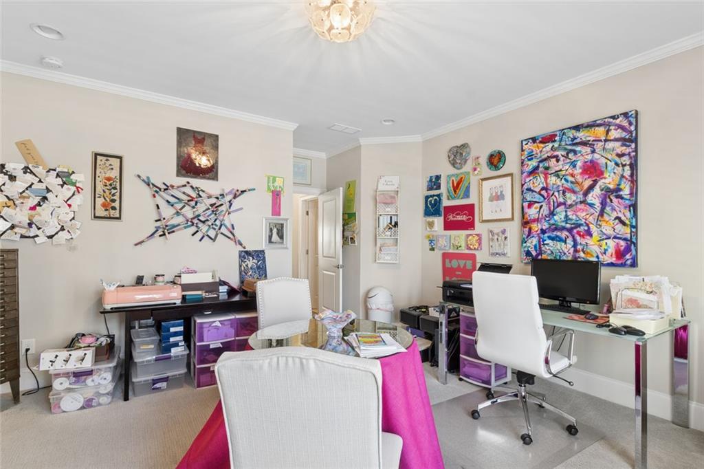 317 Riversedge Drive Atlanta, GA 30339 - Photo 38 of 68 a view of a workspace with furniture and toys
