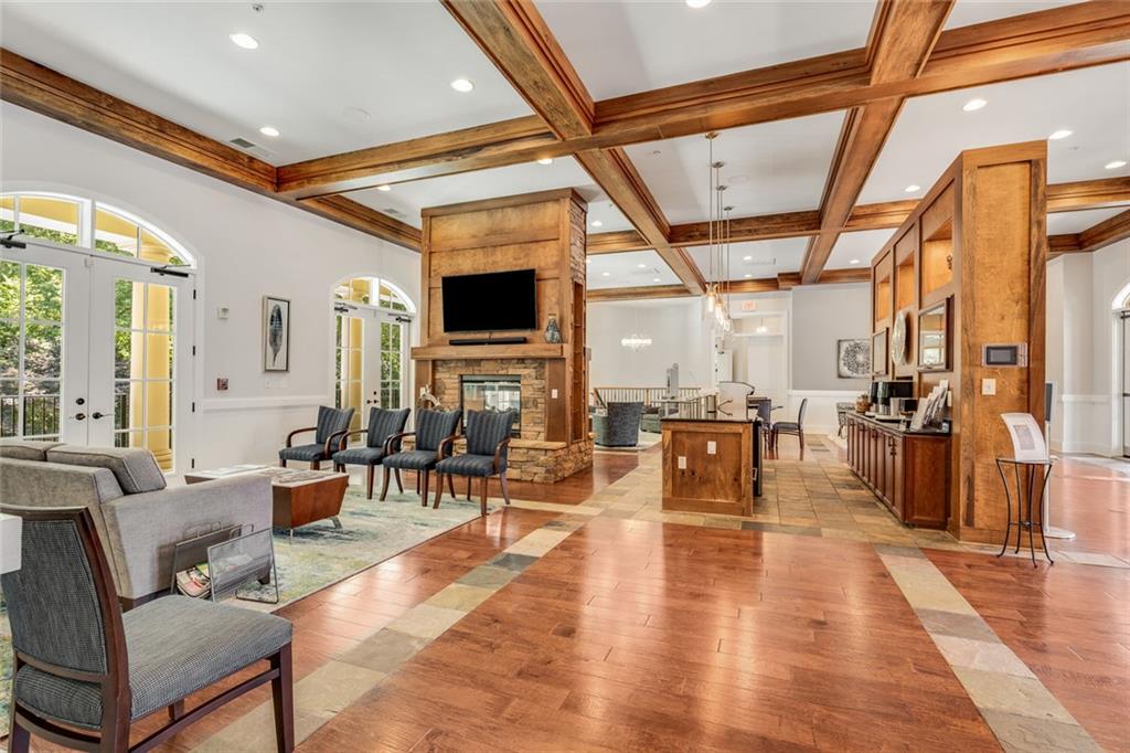 317 Riversedge Drive Atlanta, GA 30339 - Photo 51 of 68 a living room with lots of furniture and wooden floor