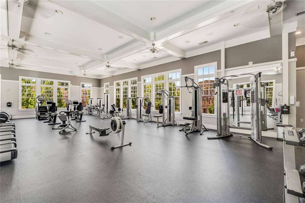 317 Riversedge Drive Atlanta, GA 30339 - Photo 53 of 68 a gym room with lots of gym equipment
