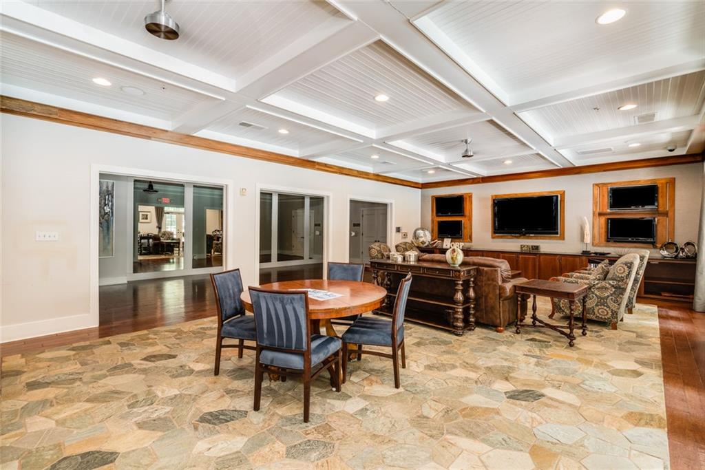 317 Riversedge Drive Atlanta, GA 30339 - Photo 57 of 68 a outdoor space with furniture a flat screen tv and a faucet