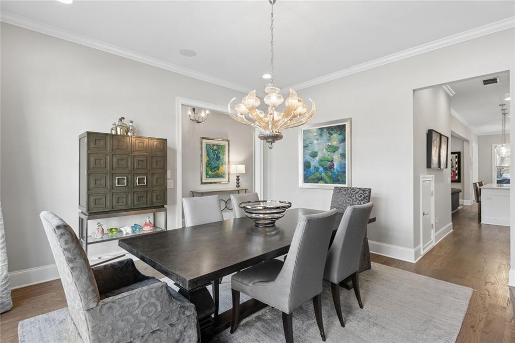 317 Riversedge Drive Atlanta, GA 30339 - Photo 7 of 68 a view of a dining room with furniture and wooden floor