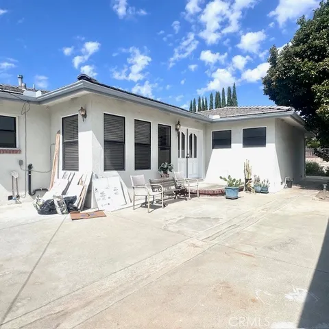 a view of a house with snow on the ground