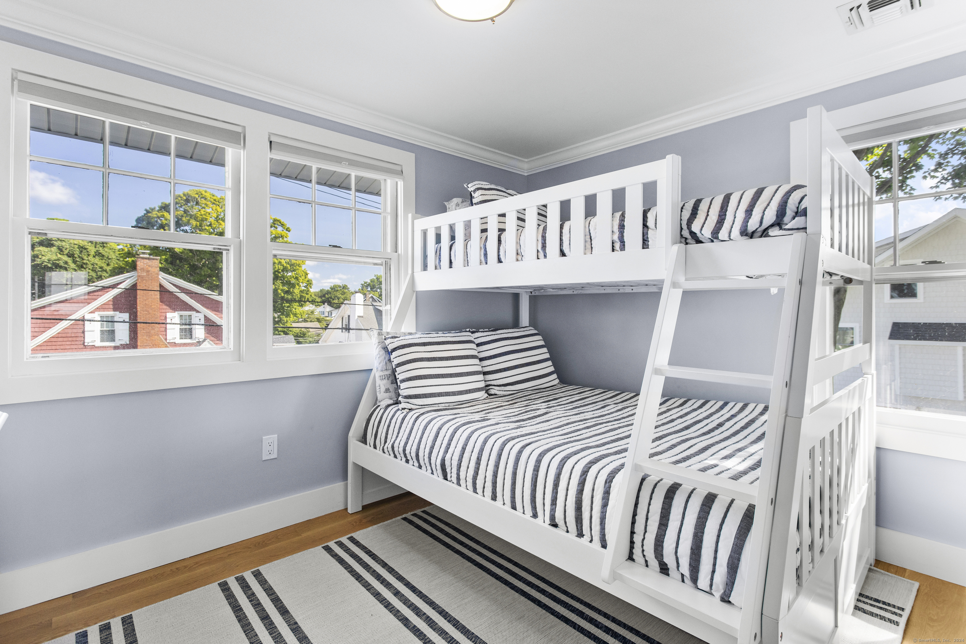 15 Cottage Road Old Lyme, CT 06371 - Photo 17 of 26 a bedroom with a bed and a window