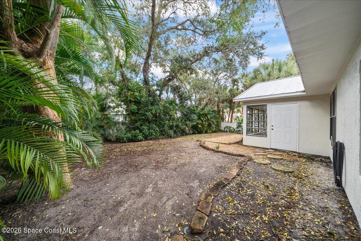 189 Abeto Terrace Sebastian, FL 32958 - Photo 26 of 38 a view of a house with a yard