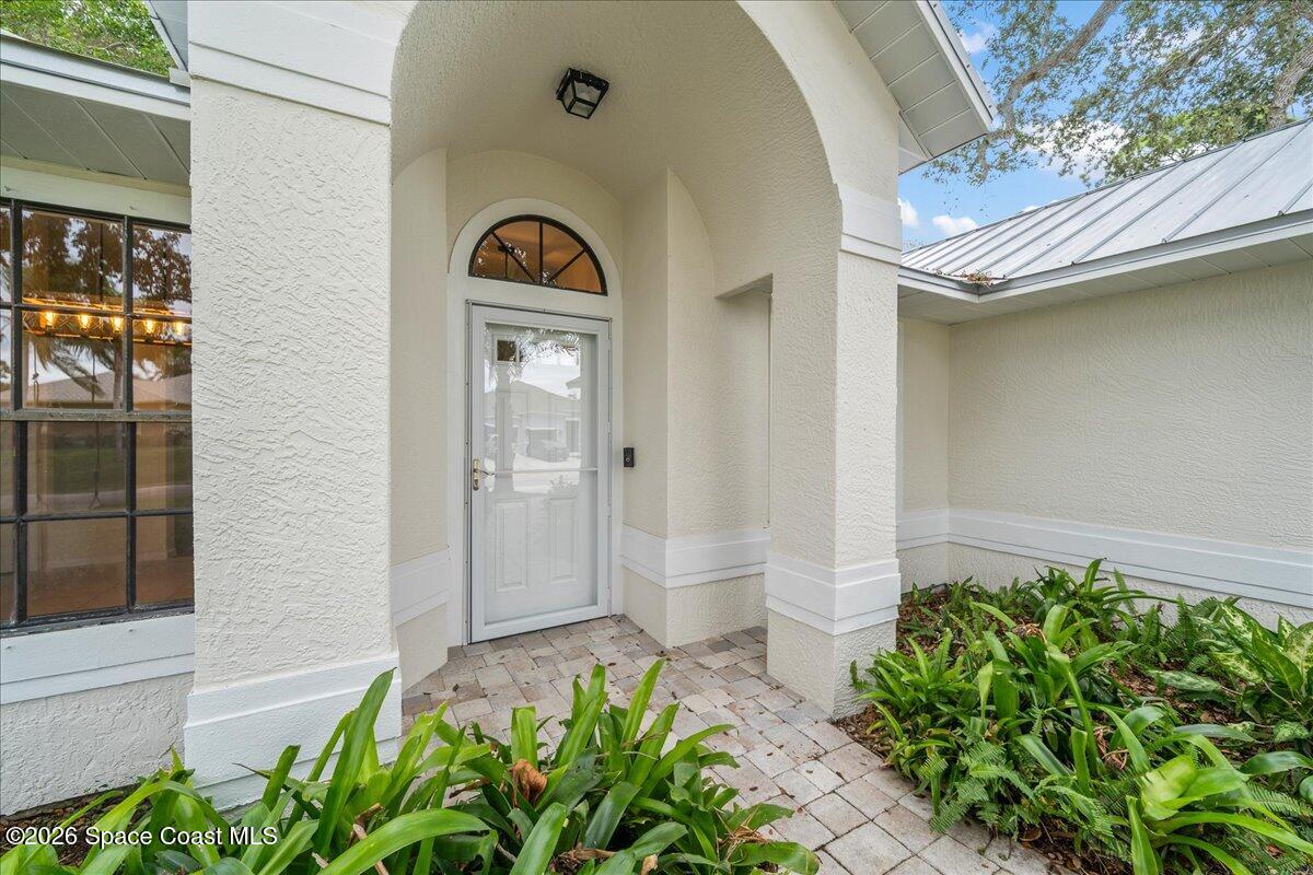 189 Abeto Terrace Sebastian, FL 32958 - Photo 5 of 38 a front view of a house with shower