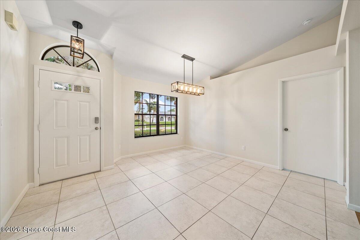 189 Abeto Terrace Sebastian, FL 32958 - Photo 6 of 38 an empty room with windows