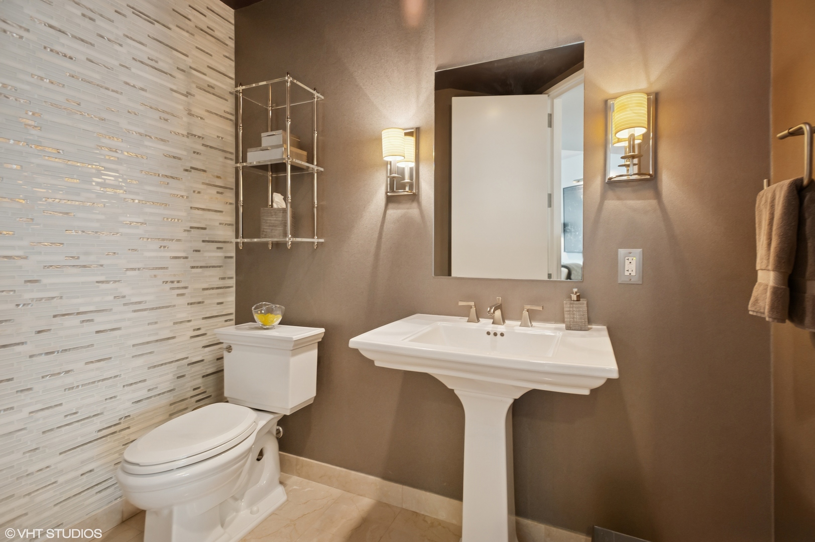 401 North Wabash Avenue, Unit 44F Chicago, IL 60611 - Photo 14 of 26 a bathroom with a sink mirror and toilet