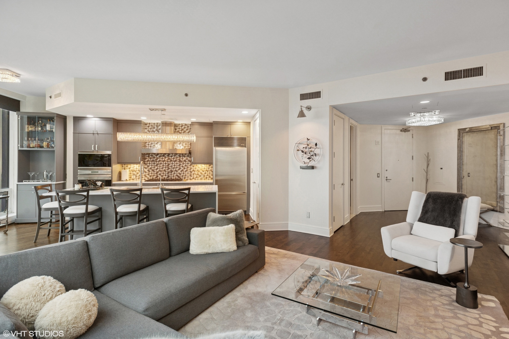 401 North Wabash Avenue, Unit 44F Chicago, IL 60611 - Photo 5 of 26 a living room with furniture kitchen view and a table