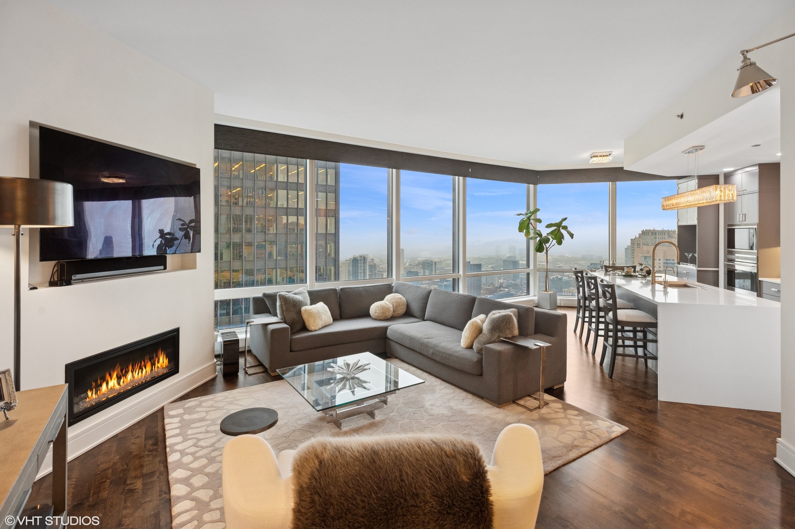 401 North Wabash Avenue, Unit 44F Chicago, IL 60611 - Photo 6 of 26 a living room with furniture and a fireplace