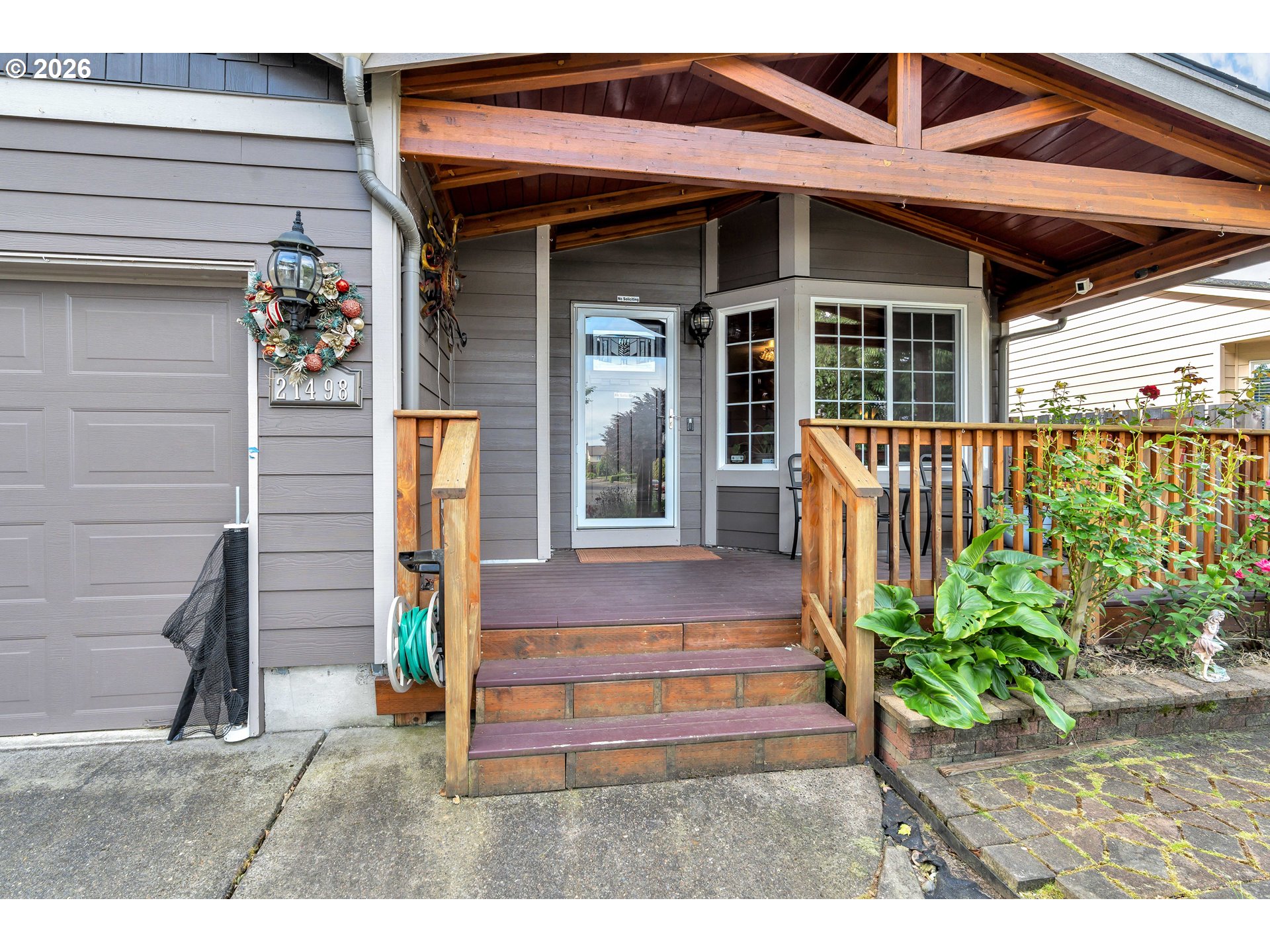 21498 Southwest Jay Street Beaverton, OR 97003 - Photo 4 of 47 a view of a house with potted plants