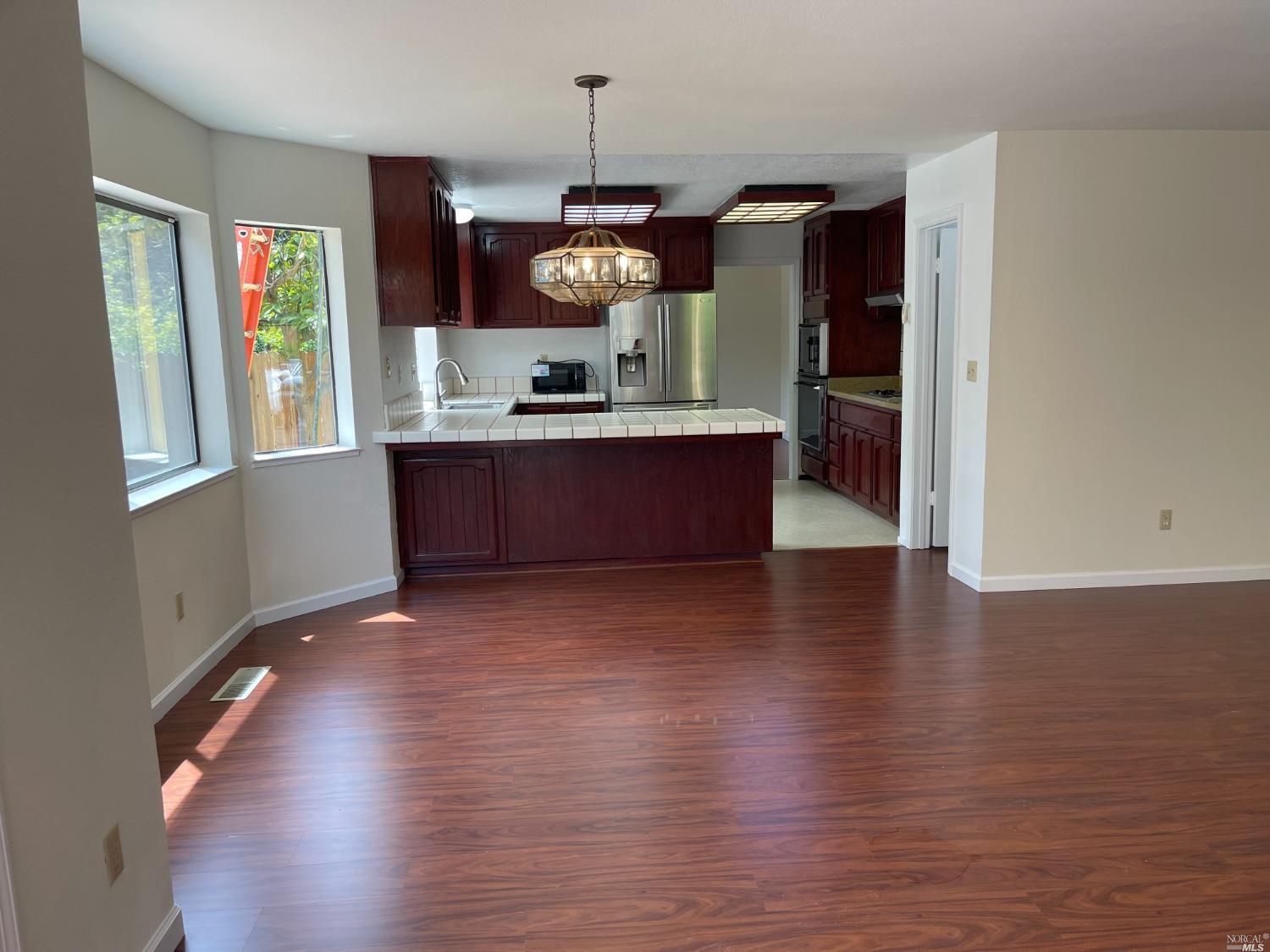 431 Darley Drive Vallejo, CA 94591 - Photo 8 of 27 a view of kitchen and hall with wooden floor