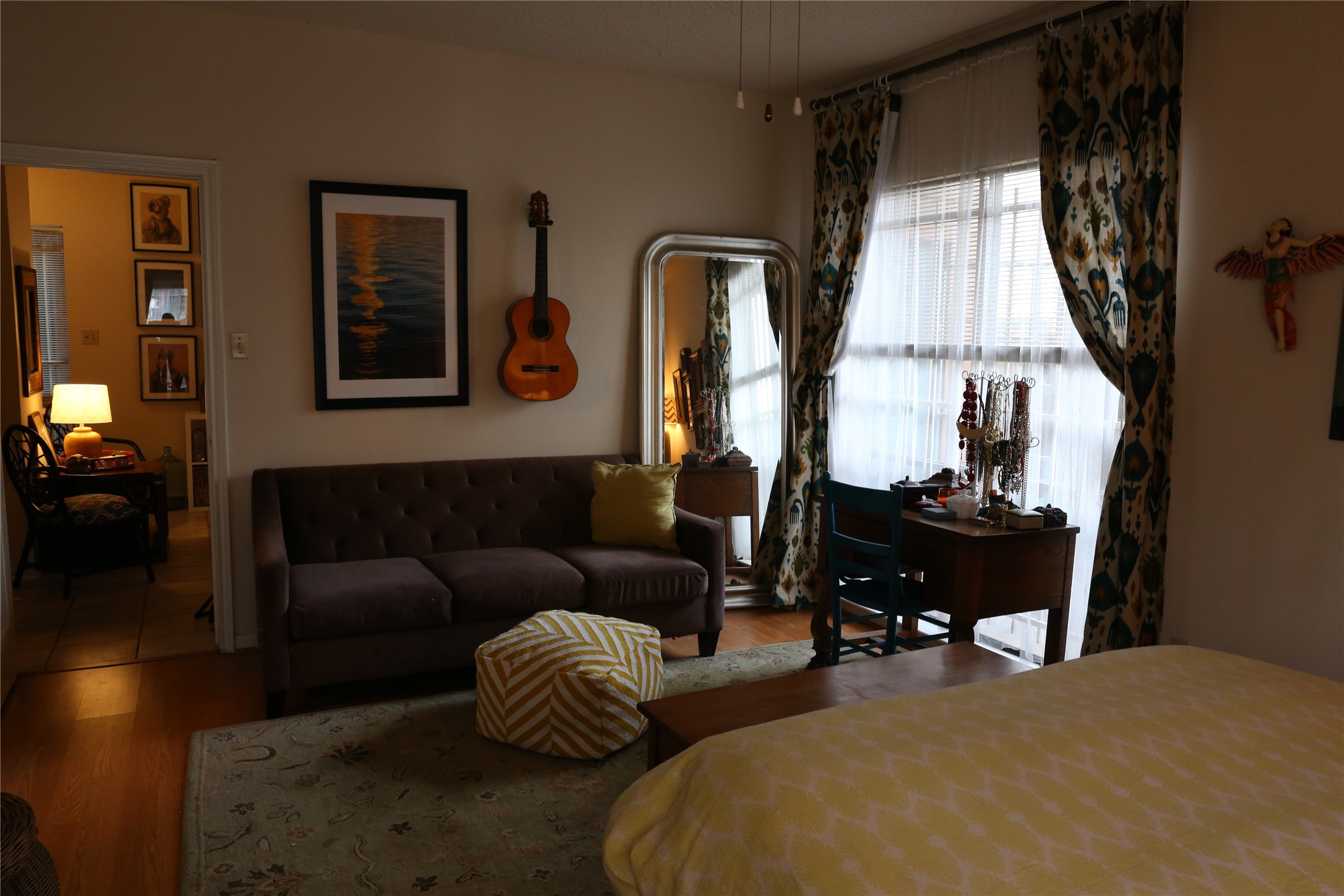 5718 Val Verde Street, Unit 7 Houston, TX 77057 - Photo 21 of 23 a living room with furniture fireplace and a large window