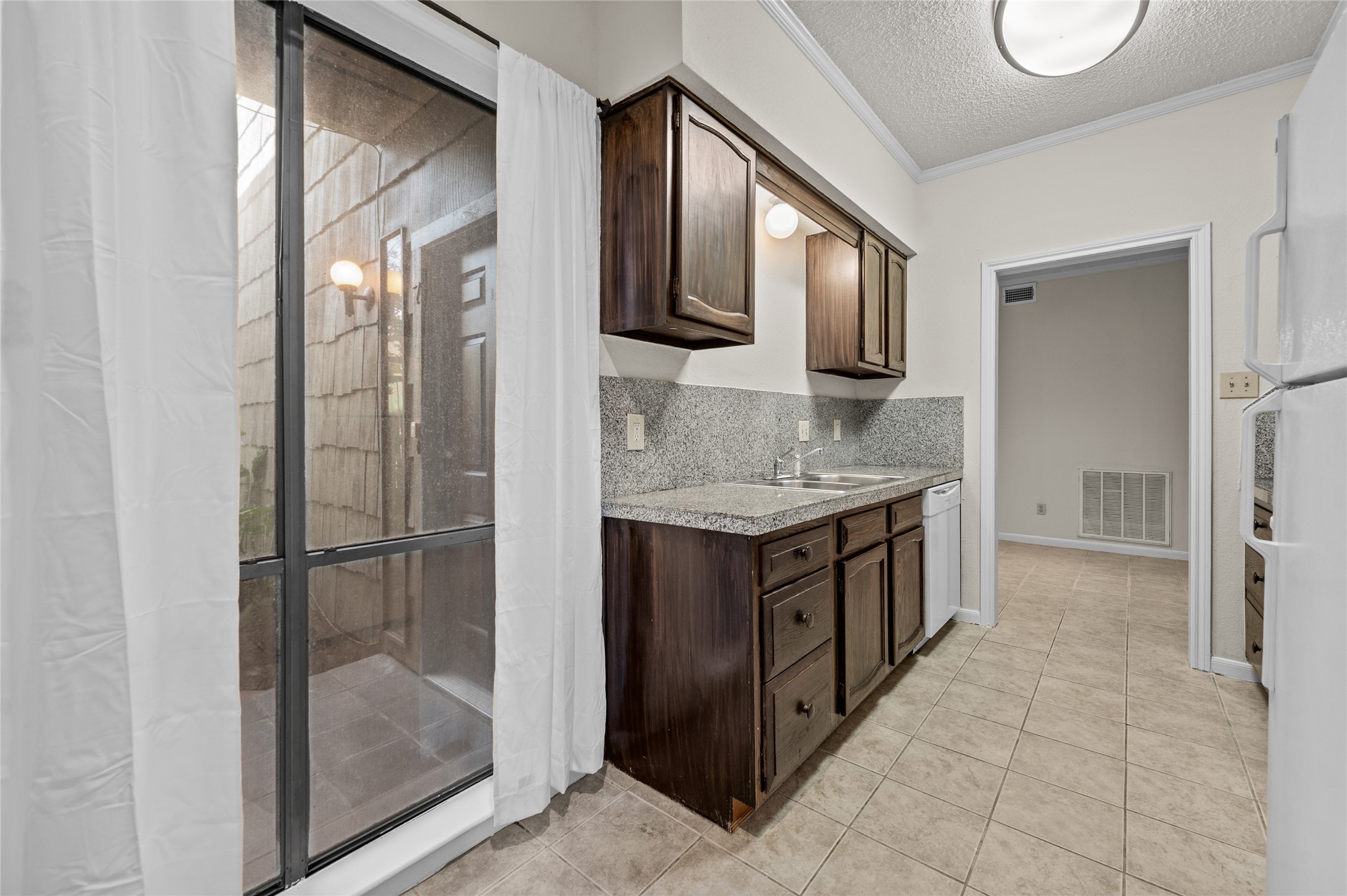 5718 Val Verde Street, Unit 7 Houston, TX 77057 - Photo 8 of 23 a bathroom with a granite countertop double vanity sink and a mirror