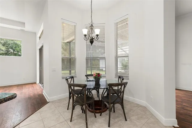 a bedroom with a bed and a dresser in it