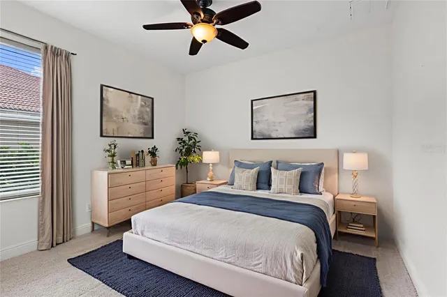 a front view of a house with a yard and tree s