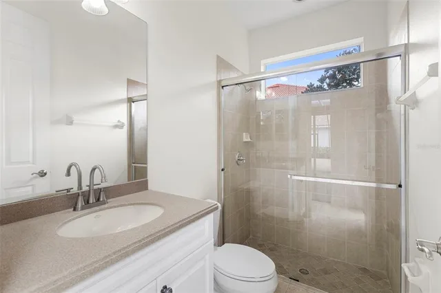 a view of a swimming pool with an outdoor seating