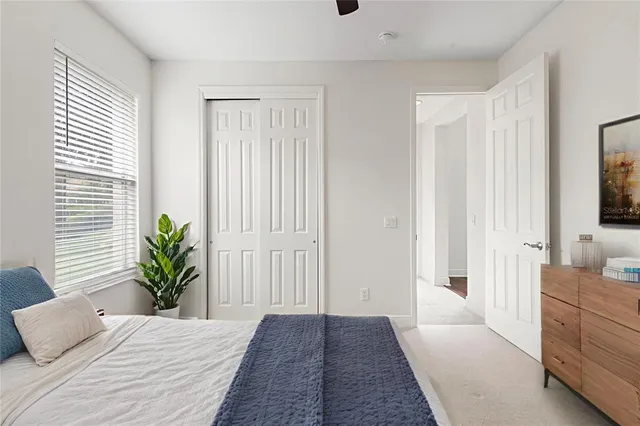 an aerial view of residential houses with outdoor space and river