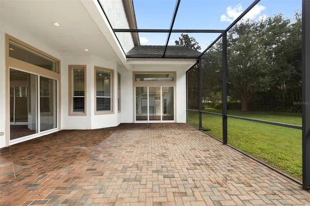 a view of a house and a big yard