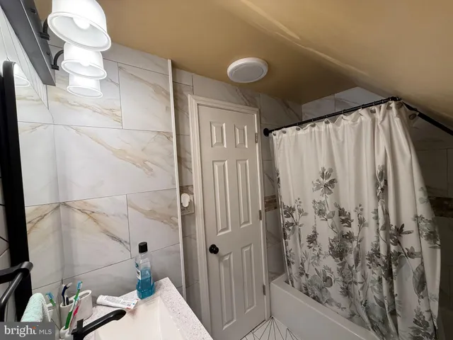 a bathroom with a sink and toilet