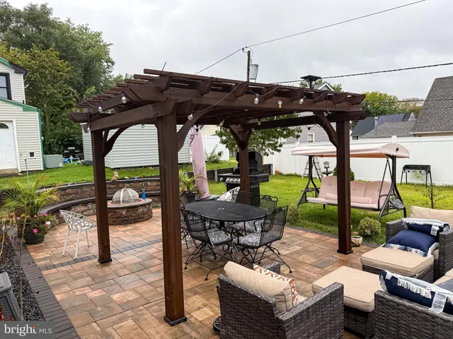 a view of yard with patio