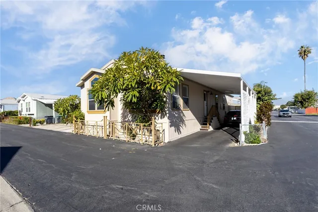 a view of a street with a building in the background