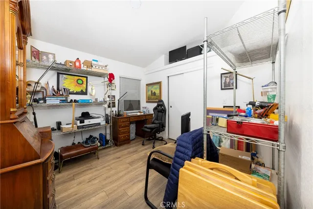 a room with furniture and a wooden floor