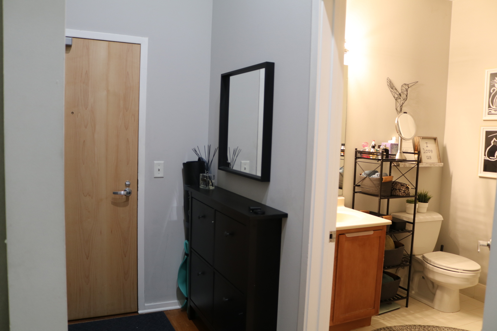 2323 West Pershing Road, Unit 319 Chicago, IL 60609 - Photo 29 of 39 a bathroom with a toilet and a shower