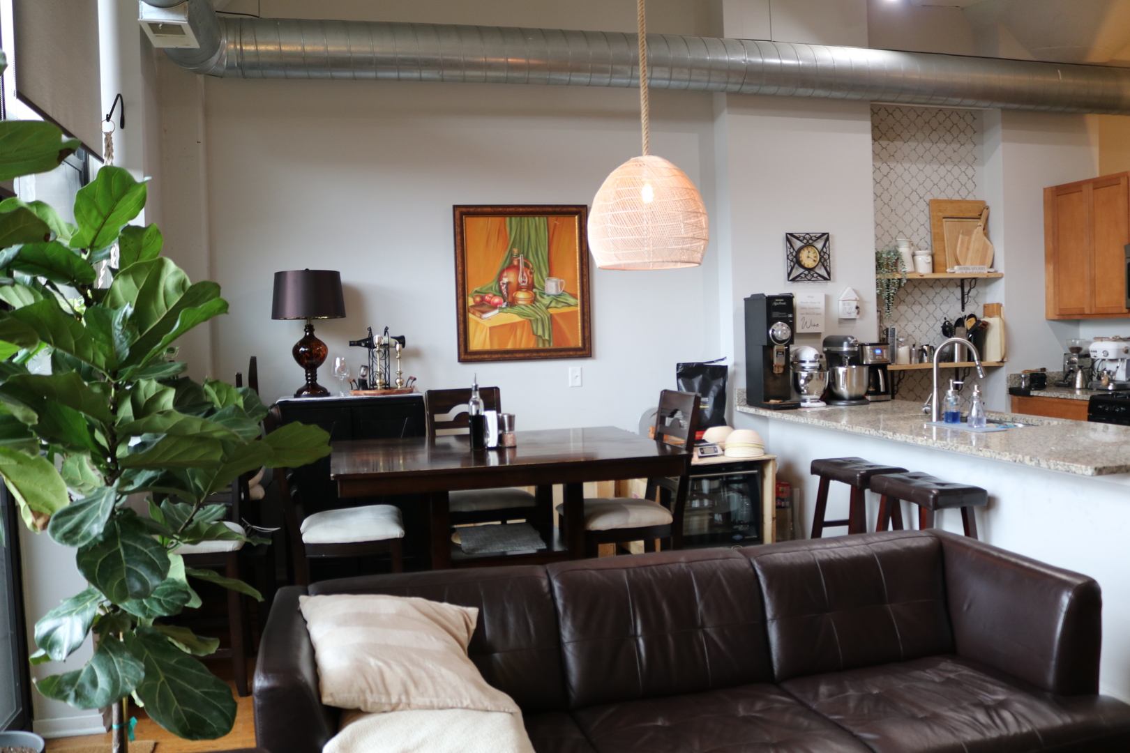 2323 West Pershing Road, Unit 319 Chicago, IL 60609 - Photo 4 of 39 a living room with furniture potted plant and a window