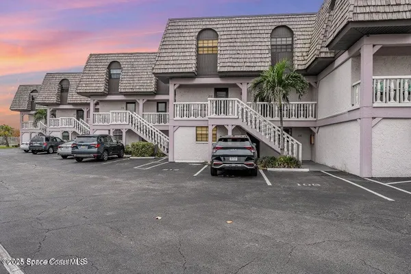 a car parked in front of a house