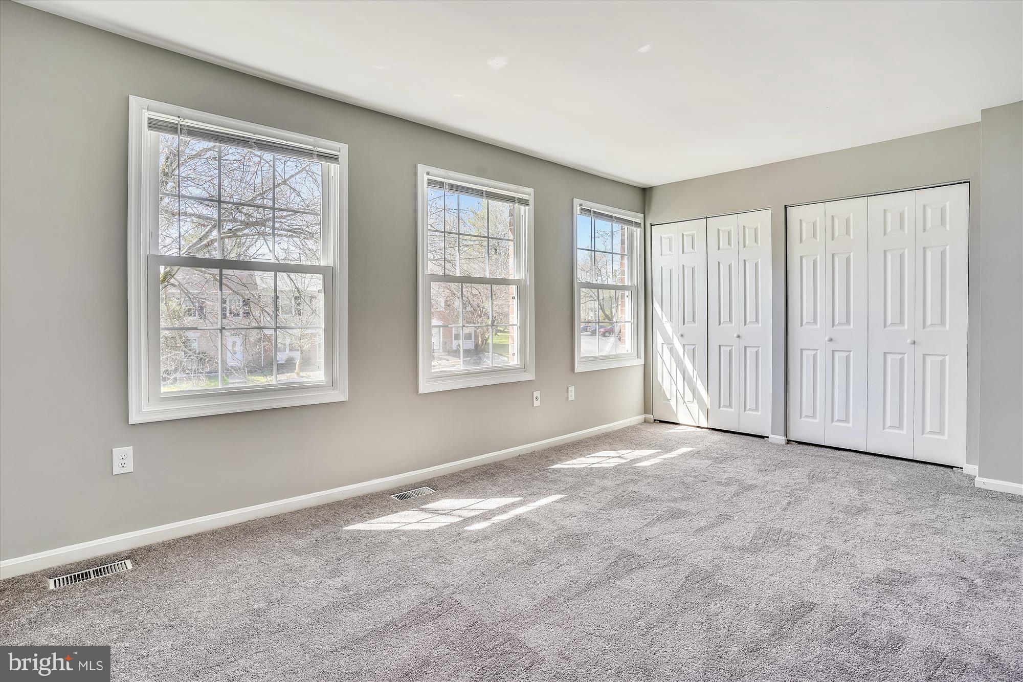 9202 Sprucewood Road Burke, VA 22015 - Photo 15 of 21 a view of an empty room with a window