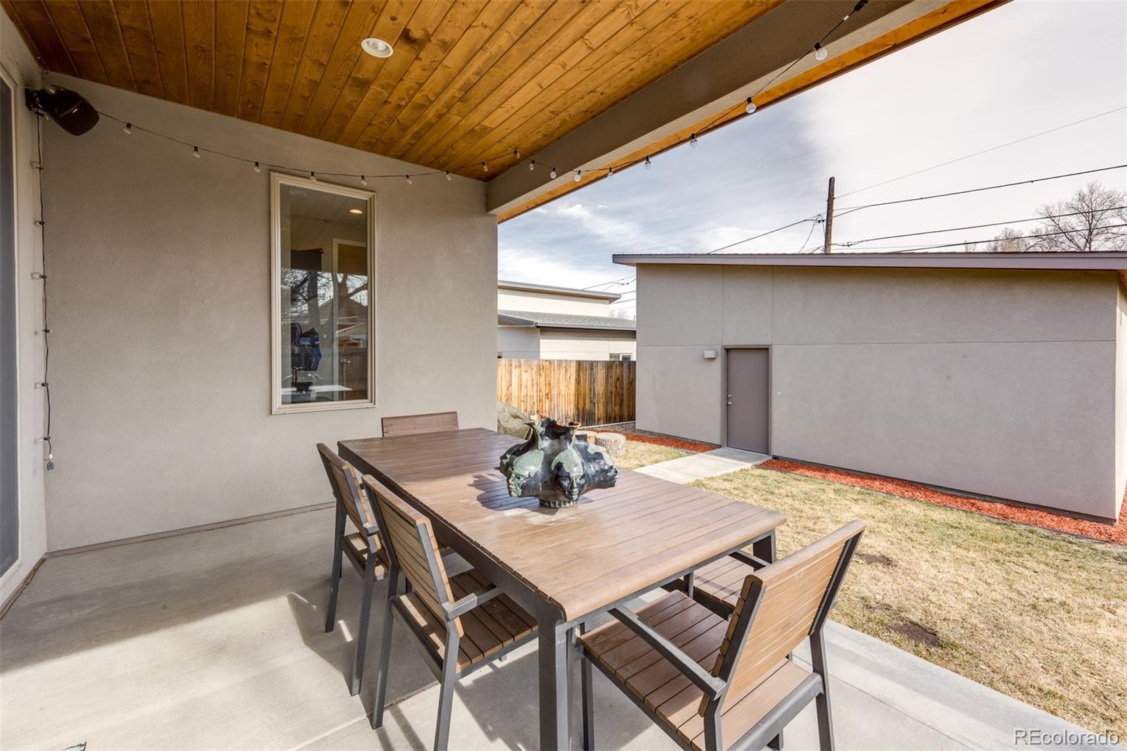 4030 Bryant Street Denver, CO 80211 - Photo 25 of 26 a view of a dining room with furniture