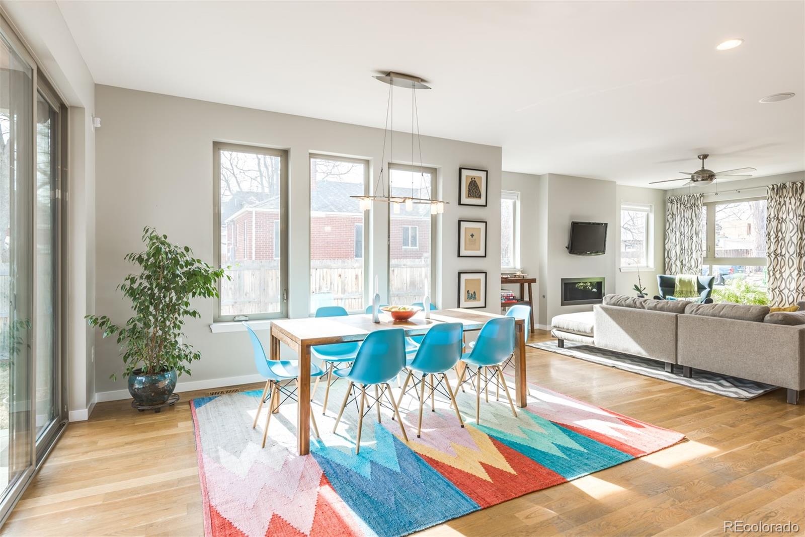 4030 Bryant Street Denver, CO 80211 - Photo 6 of 26 a view of a dining room with furniture window and wooden floor