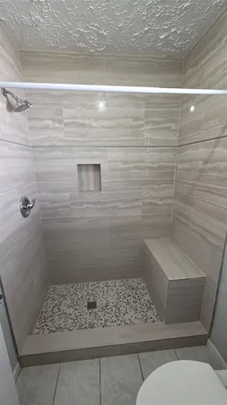 a room with a cabinets and utility room