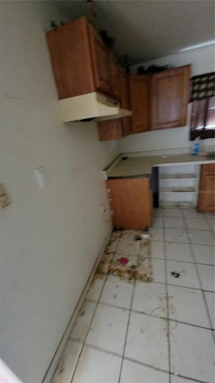 216 Northwest 4th Avenue Mulberry, FL 33860 - Photo 18 of 45 a room with storage and utility